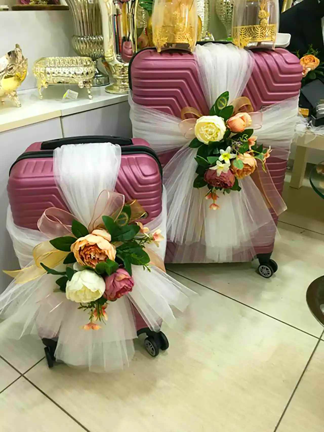 تزئین چمدان عروس و داماد